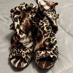 Brown animal print lace up ankle high heels